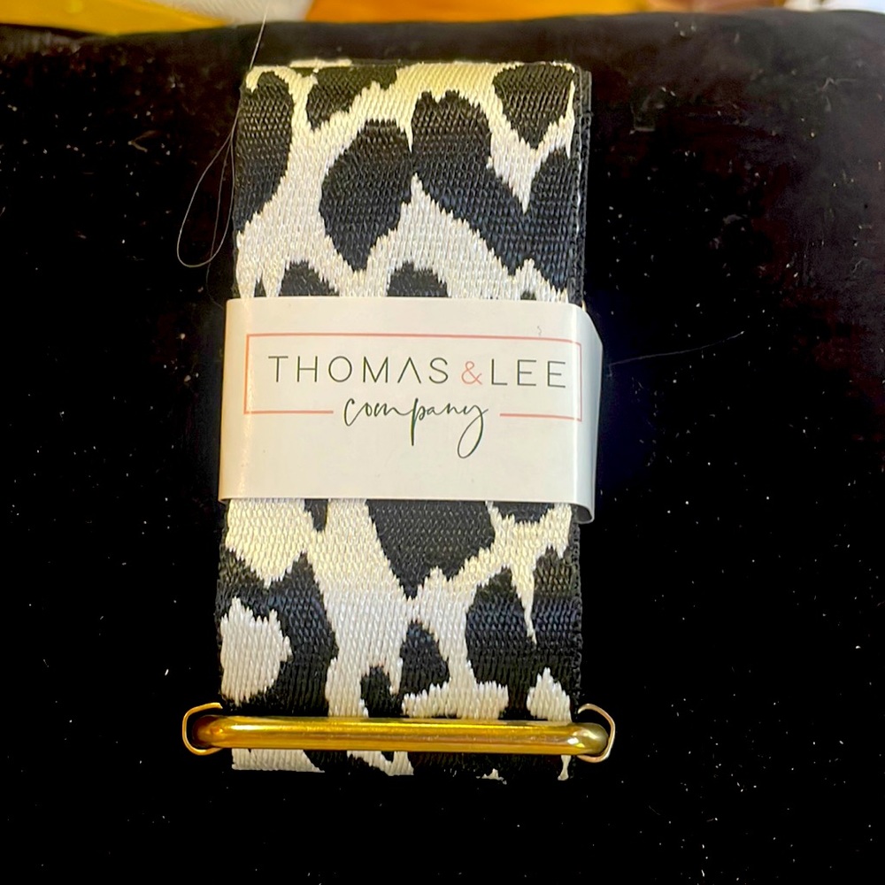 Black and white purse strap.